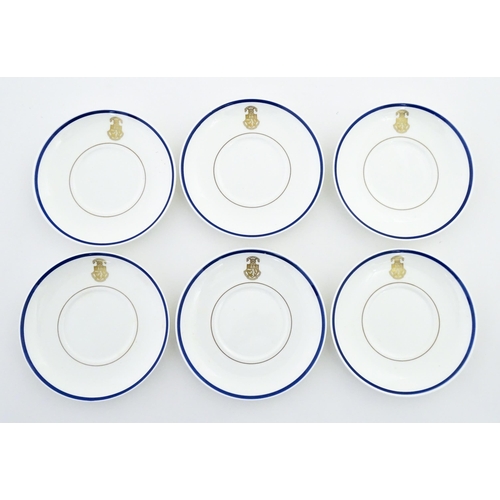 194 - A set of six Wedgwood coffee cups and saucers with gilt Harrow School crest detail. Box approx. 12 3... 