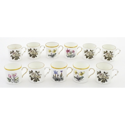 195 - Twelve Royal Worcester coffee cups and saucers decorated in the British Wildflower pattern. Cups app... 