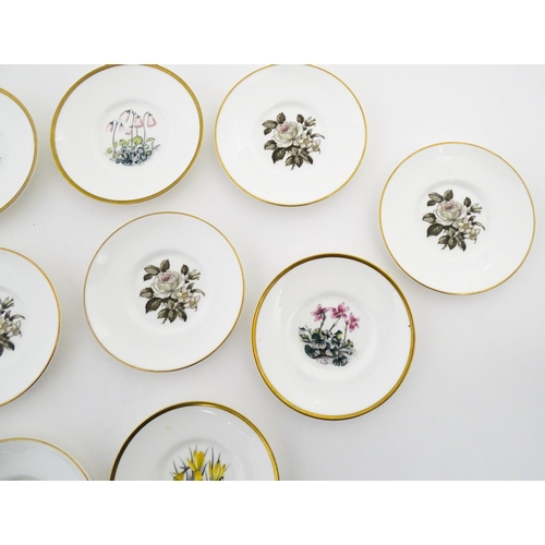 195 - Twelve Royal Worcester coffee cups and saucers decorated in the British Wildflower pattern. Cups app... 
