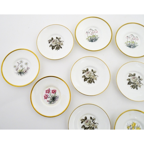 195 - Twelve Royal Worcester coffee cups and saucers decorated in the British Wildflower pattern. Cups app... 