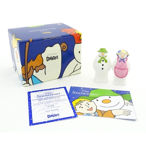 196 - A boxed Coalport limited edition The Snowman cruet comprising Snowman and Lady Snowman salt and pepp... 