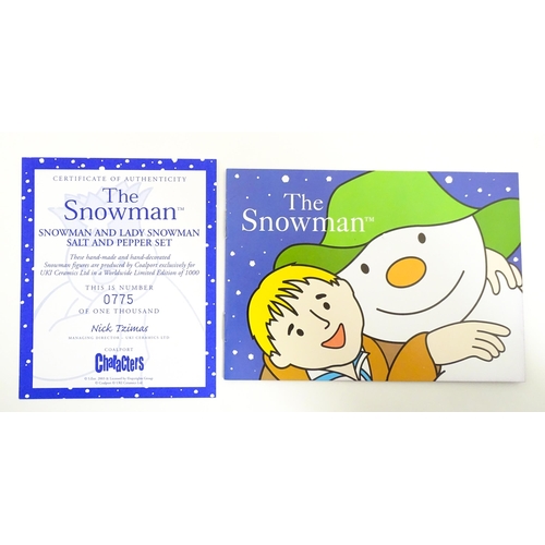 196 - A boxed Coalport limited edition The Snowman cruet comprising Snowman and Lady Snowman salt and pepp... 
