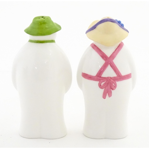 196 - A boxed Coalport limited edition The Snowman cruet comprising Snowman and Lady Snowman salt and pepp... 