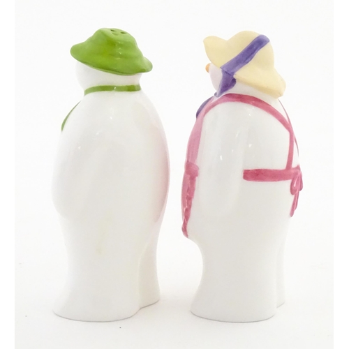 196 - A boxed Coalport limited edition The Snowman cruet comprising Snowman and Lady Snowman salt and pepp... 