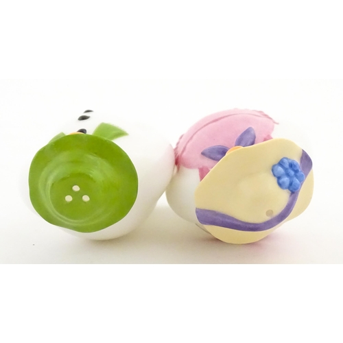 196 - A boxed Coalport limited edition The Snowman cruet comprising Snowman and Lady Snowman salt and pepp... 