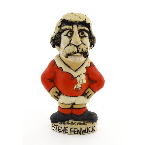 197 - A John Hughes pottery Grogg of Steve Fenwick in a Welsh red rugby jersey. Signed under. Approx. 6