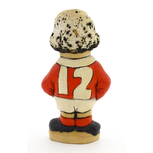 197 - A John Hughes pottery Grogg of Steve Fenwick in a Welsh red rugby jersey. Signed under. Approx. 6