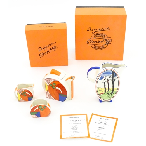 203 - A Wedgwood Clarice Cliff Centenary Stamford teapot, sugar bowl and cream jug in the Melon pattern, a... 