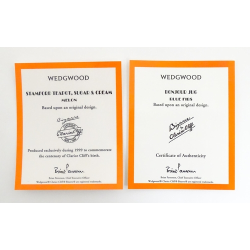 203 - A Wedgwood Clarice Cliff Centenary Stamford teapot, sugar bowl and cream jug in the Melon pattern, a... 