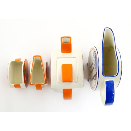 203 - A Wedgwood Clarice Cliff Centenary Stamford teapot, sugar bowl and cream jug in the Melon pattern, a... 