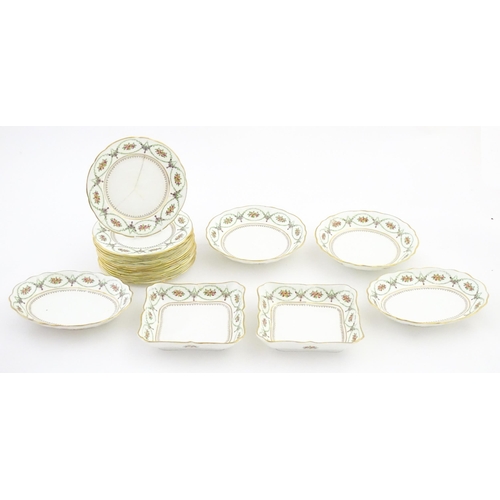 213 - A quantity of Soane & Smith Ltd. dessert wares with flower and garland detail, to include plates and... 