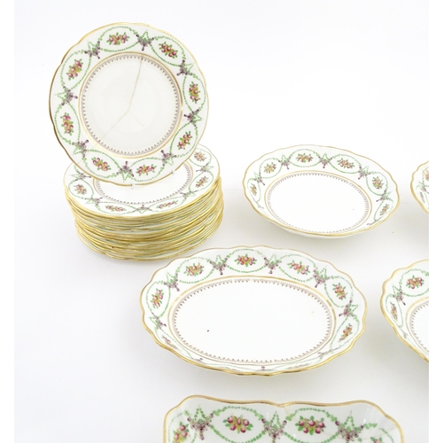 213 - A quantity of Soane & Smith Ltd. dessert wares with flower and garland detail, to include plates and... 