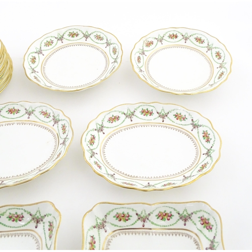 213 - A quantity of Soane & Smith Ltd. dessert wares with flower and garland detail, to include plates and... 
