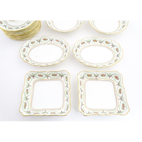 213 - A quantity of Soane & Smith Ltd. dessert wares with flower and garland detail, to include plates and... 