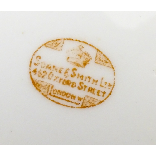 213 - A quantity of Soane & Smith Ltd. dessert wares with flower and garland detail, to include plates and... 