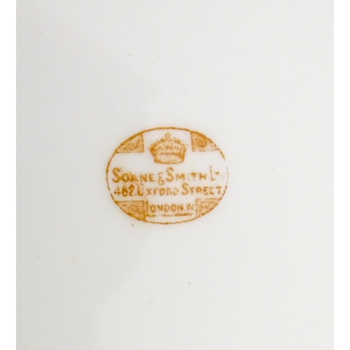 213 - A quantity of Soane & Smith Ltd. dessert wares with flower and garland detail, to include plates and... 