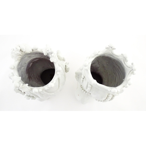 214 - A pair of Sicilian / Southern Italian terracotta Testa di Moro / Moor's Heads sculptural vases model... 