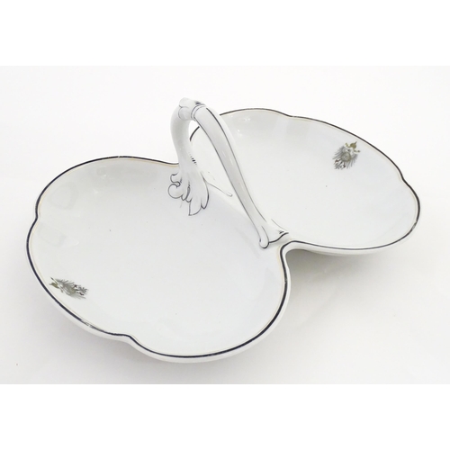 217 - A German Fraureuth serving dish with central handle with Imperial eagle crest detail. Marked under. ... 