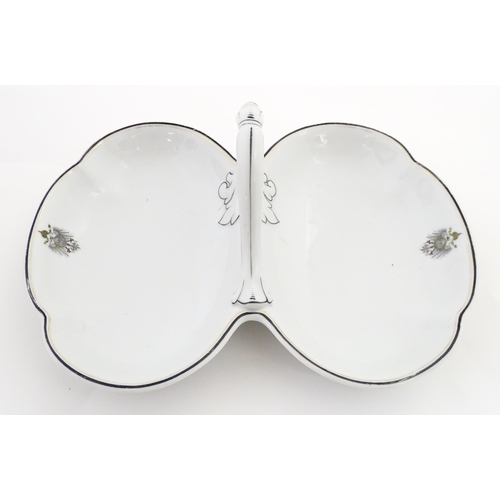 217 - A German Fraureuth serving dish with central handle with Imperial eagle crest detail. Marked under. ... 