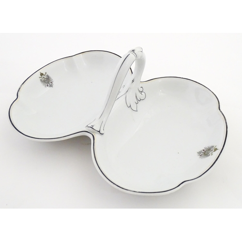 217 - A German Fraureuth serving dish with central handle with Imperial eagle crest detail. Marked under. ... 