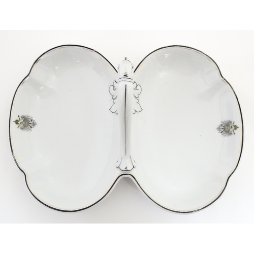 217 - A German Fraureuth serving dish with central handle with Imperial eagle crest detail. Marked under. ... 