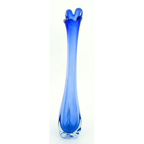 232 - A large blue glass vase of elongated swung form with flared rim. Possibly Murano. Approx. 26