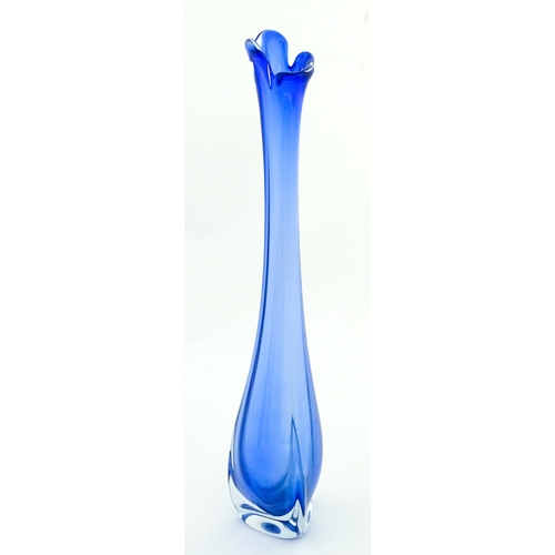 232 - A large blue glass vase of elongated swung form with flared rim. Possibly Murano. Approx. 26