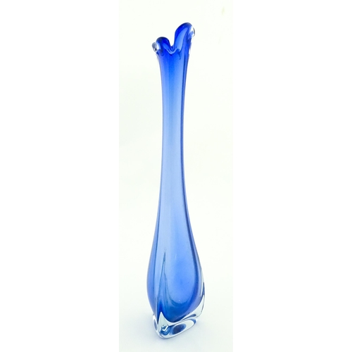 232 - A large blue glass vase of elongated swung form with flared rim. Possibly Murano. Approx. 26