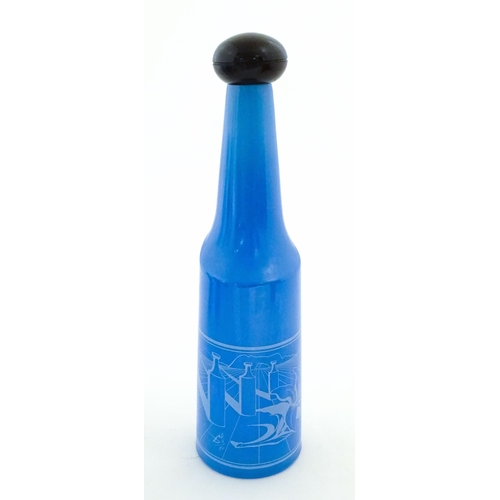 307 - A 1970s Rosso Antico glass bottle designed by Salvador Dali. Approx. 13 1/42 high