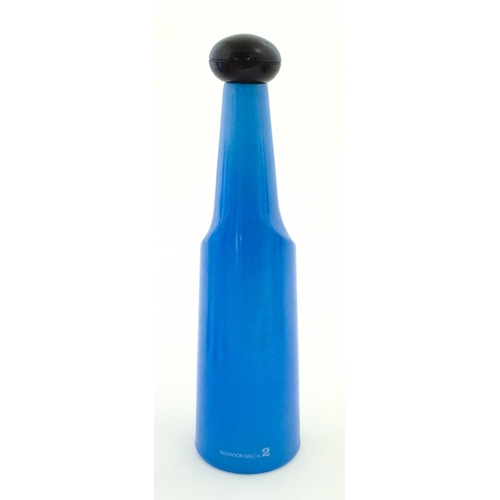 307 - A 1970s Rosso Antico glass bottle designed by Salvador Dali. Approx. 13 1/42 high