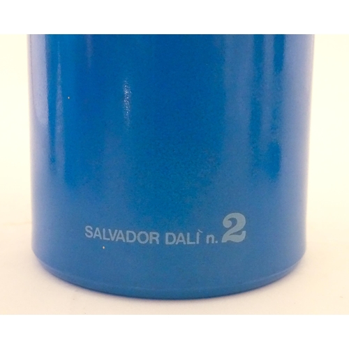 307 - A 1970s Rosso Antico glass bottle designed by Salvador Dali. Approx. 13 1/42 high