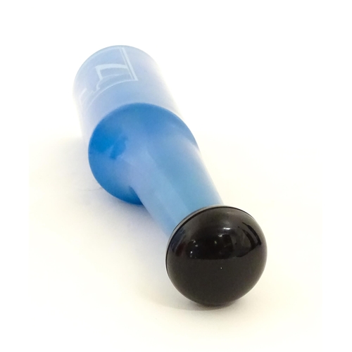 307 - A 1970s Rosso Antico glass bottle designed by Salvador Dali. Approx. 13 1/42 high