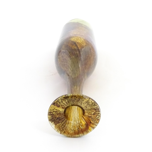 308 - A Mdina glass bottle vase. Signed under and with paper Mdina label. Approx. 14