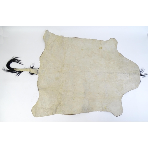 1323 - Taxidermy: a late 20thC Blue Wildebeest hide, approx 102