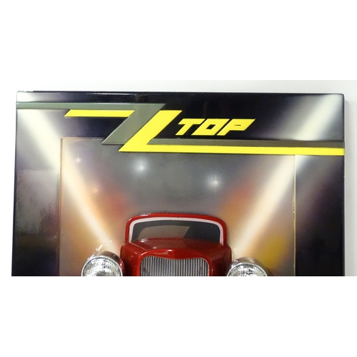 1167 - Pop Music Memorabilia: A ZZ Top fibreglass 'Eliminator' album promotional wall display depicting a H... 