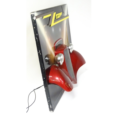 1167 - Pop Music Memorabilia: A ZZ Top fibreglass 'Eliminator' album promotional wall display depicting a H... 