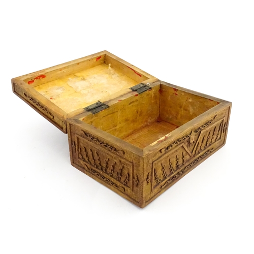 1035 - A Chinese carved sandalwood box decorated with central roundel depicting two figures bordered by fol... 