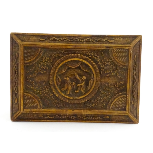 1035 - A Chinese carved sandalwood box decorated with central roundel depicting two figures bordered by fol... 