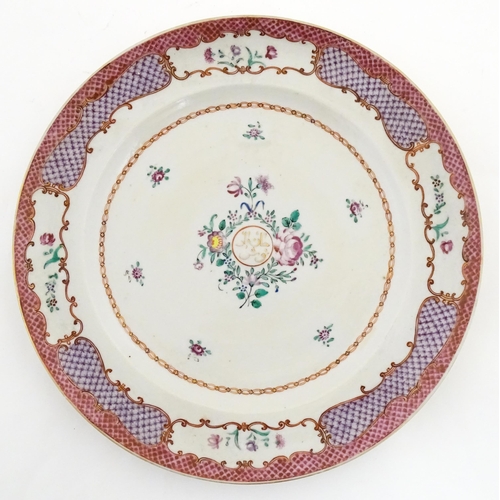 12 - A Chinese famille rose porcelain dish for the Islamic market with central roundel of Persian script ... 