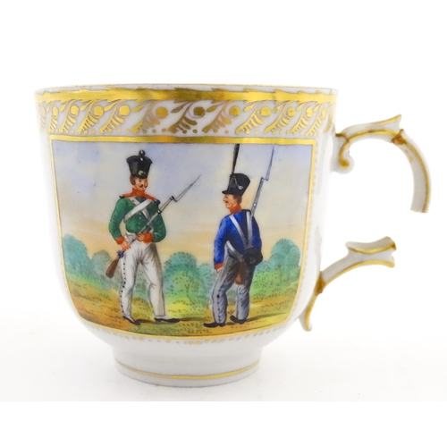 222 - Two Polish Korzec tea cups and saucers with hand painted decoration depicting 18thC Infantry soldier... 