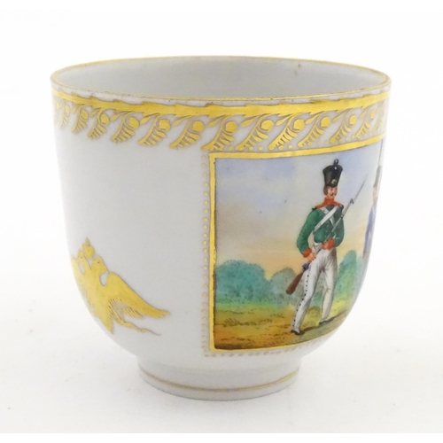 222 - Two Polish Korzec tea cups and saucers with hand painted decoration depicting 18thC Infantry soldier... 