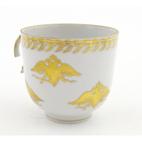 222 - Two Polish Korzec tea cups and saucers with hand painted decoration depicting 18thC Infantry soldier... 