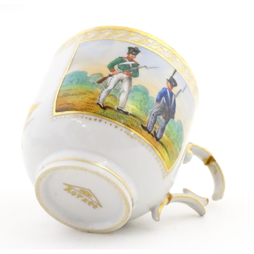 222 - Two Polish Korzec tea cups and saucers with hand painted decoration depicting 18thC Infantry soldier... 