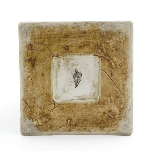 226 - A Chinese vase of squared form with a yellow ground decorated with blossom, peonies, lotus leaves, b... 