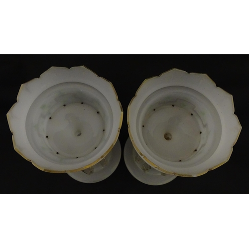 303 - Two Victorian opaque glass table lustres with gilt detail and glass lustre drops. Approx. 12 3/4