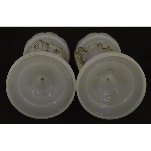 303 - Two Victorian opaque glass table lustres with gilt detail and glass lustre drops. Approx. 12 3/4
