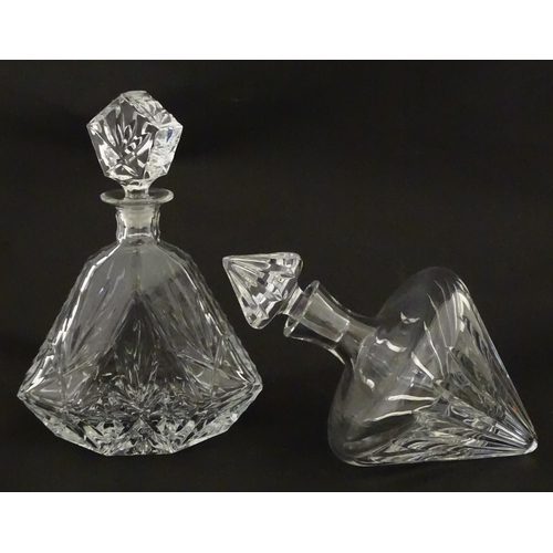 310 - A Stuart Crystal tilted decanter. Together with a Thomas Webb cut crystal decanter. Largest approx. ... 
