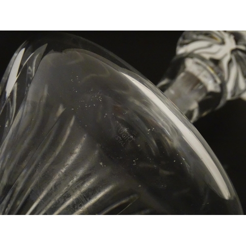 310 - A Stuart Crystal tilted decanter. Together with a Thomas Webb cut crystal decanter. Largest approx. ... 