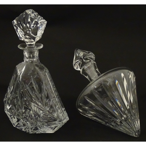 310 - A Stuart Crystal tilted decanter. Together with a Thomas Webb cut crystal decanter. Largest approx. ... 