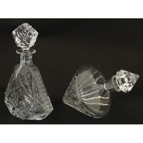 310 - A Stuart Crystal tilted decanter. Together with a Thomas Webb cut crystal decanter. Largest approx. ... 